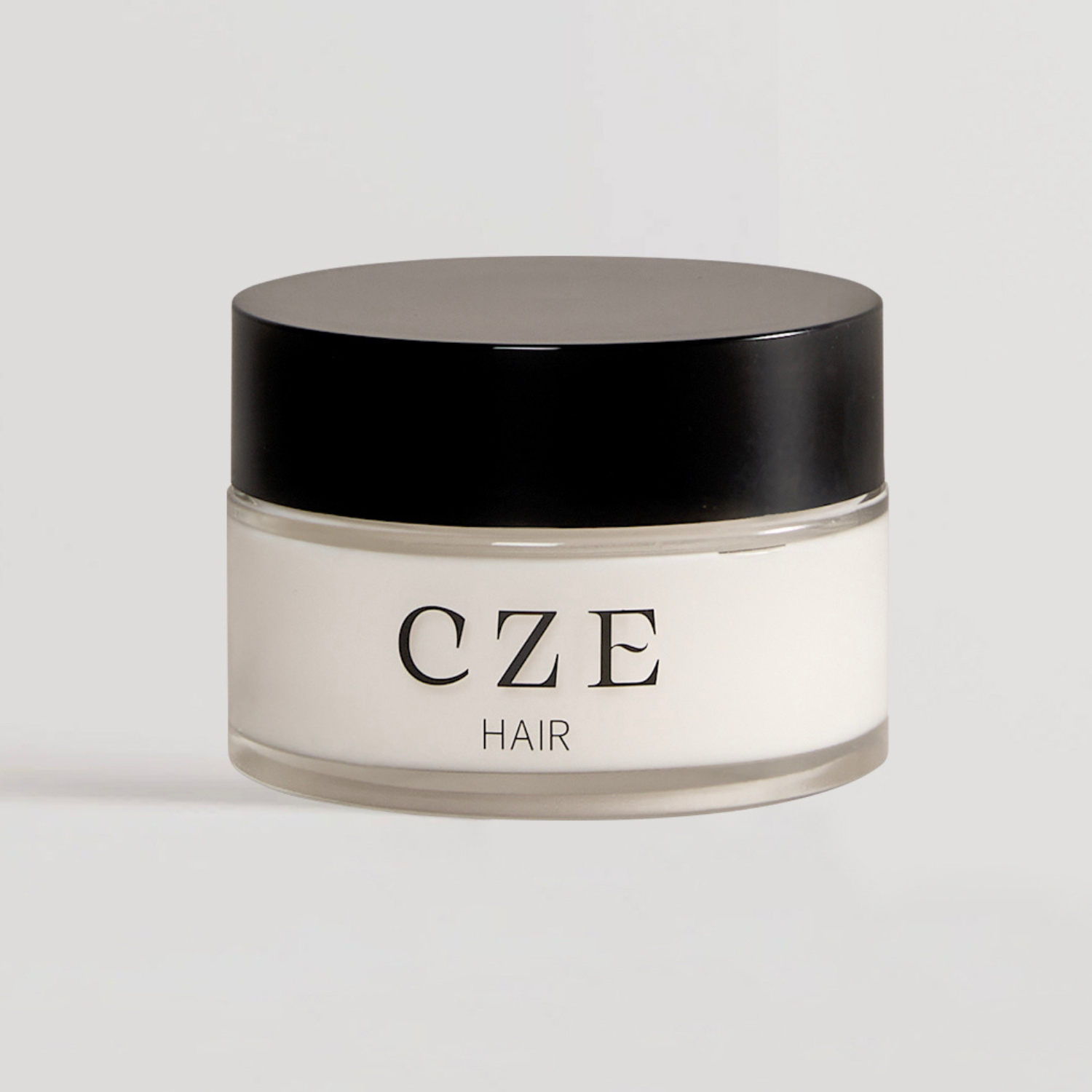 CZE Hair lightweight anti-frizz styling cream in glass jar – made in New Zealand.
