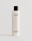 White 300ml bottle of CZE Hair Silk Conditioner – hydrates, strengthens, and nourishes for soft, smooth hair